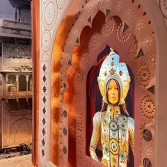 A detail from the 'Indofuturism' installation, where a futuristic portrait is framed by a felt-and-embroidered 'Mahal' archway. This deliberate juxtaposition of the digital and the handcrafted is central to our exploration of India's emerging visual culture.