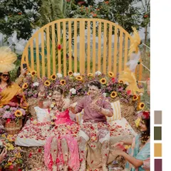 A Haldi ceremony is a shower of blessings and joy. This candid moment captures the beautiful chaos as the couple is lovingly covered in flower petals by their family and friends.