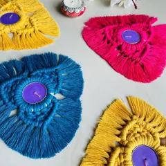 A vibrant collection of my macrame tealight holders. These are a great way to add a pop of color and handmade charm to your Diwali decorations.