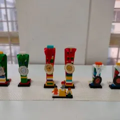 Students get creative by building their own trophies and medals out of LEGOs after an internal competition. This fun activity celebrates participation and achievement for everyone.