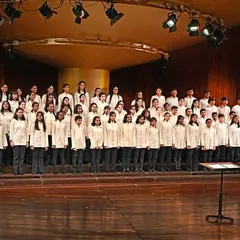 Our full Singing Tree Choir on stage at the NCPA, conducted with precision and passion. This image captures the scale and professionalism of our annual choral concerts.