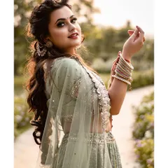 A portrait is a story, and this one is full of joy and grace. We were shooting outdoors, and her smile lit up the entire frame. It shows how a beautiful traditional lehenga can shine in natural light.