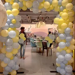 A Minions-themed party is always a hit with the kids. Here, we've created a fun and vibrant balloon arch using the signature yellow and blue colors to set the stage for a playful and memorable second birthday celebration.