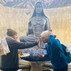 Receiving blessings before the Adiyogi statue in Kedarnath. A moment of surrender and connection to the source of yoga.