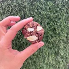 Our gluten-free Chocolate, Almond, and Oat cookie. It's a hearty, wholesome treat that's perfect for a quick energy boost.