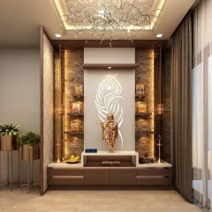 A backlit panel with an elegant peacock feather design serves as the radiant centerpiece of this mandir. The light source creates a halo effect around the Krishna idol, enhancing the blend of wood and stone textures.