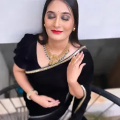 A classic combination of a black saree and red lipstick. For this look, I created a sharp winged liner and a bold red lip, giving it a timeless and elegant feel. The eyeshadow is a soft brown shimmer, adding depth without being too heavy.