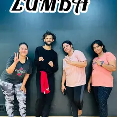 Another look at our members during a Zumba toning session. We believe in a holistic approach to fitness, combining cardio dance with muscle conditioning.
