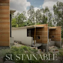 Sustainable architecture at its finest. This rammed earth structure blends seamlessly into the landscape, reflecting the very earth it rises from.