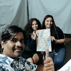 A selfie with some happy clients at a carnival. It was a pleasure drawing for them.