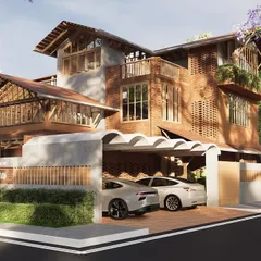 This residence is a study in climate-responsive design, using exposed brick, lime plaster, and tiled sloping roofs for passive cooling. A prominent brick *jaali* wall provides privacy while allowing for natural ventilation, creating a home that is both sustainable and timeless.
