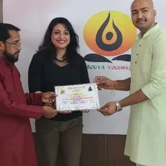A proud moment as a student receives her certification. Each graduate represents a new beginning and another step towards a healthier community.