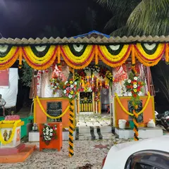 A full view of our decoration for a Maghi Ganpati pandal. We used traditional yellow and orange marigold garlands to adorn the entire structure, creating a vibrant and festive look for the community celebration.