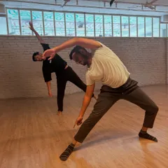 Two dancers in our X Sense course explore dynamic shapes. Our program is a unique blend of professional contemporary technique and dance theatre, taught by empathetic teachers who guide you on your journey.
