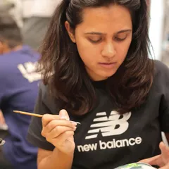 A close-up shot of me getting into the zone at the New Balance event. Every custom piece requires focus and a steady hand to get the details just right, whether it's a logo, a character, or a complex pattern.