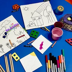 Our Weekend Creative Boards session in action. Here, toddlers use various materials to color and decorate pre-drawn canvases. This sensory art activity helps children explore, investigate, and create using their senses.