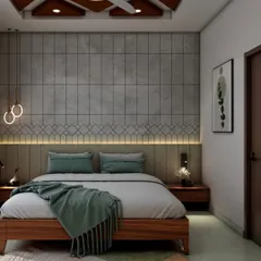 A contemporary bedroom with a unique geometric-patterned false ceiling. The accent wall behind the bed features concrete-finish tiles and a backlit headboard, complemented by modern pendant lights for a chic, industrial look.