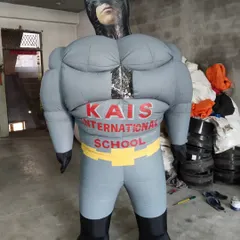 The Dark Knight comes to life as a large inflatable mascot. This Batman costume was customized for an international school event.