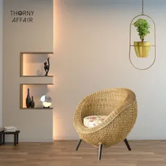Elevate your greenery with a hanging metal planter. This piece, with its elegant gold finish and modern design, is perfect for adding a stylish accent to a quiet reading corner.
