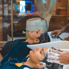 Friends who spa together, stay together. Two clients enjoying a relaxing hair wash side-by-side.