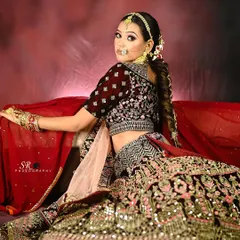 A dynamic pose that showcases the flow and detail of the embroidered lehenga. I direct models to create poses that feel both graceful and powerful, giving ethnic wear a modern, confident edge.