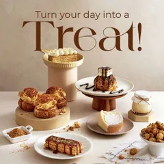 Turn your day into a treat with this spread of my gourmet desserts. The photo features a variety of pastries including eclairs, choux buns, cheesecake, and other single-serving delights available at the cafe.
