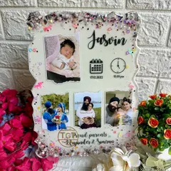The zigzag edge and glittery border give this baby announcement frame a fun and celebratory feel. It's a beautiful way to display precious family memories.