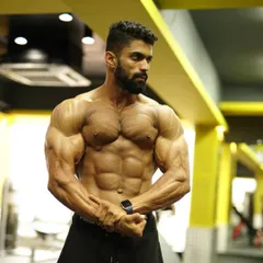 Winners never quit. This is the mindset we build. This photo shows the upper body conditioning required for competition, from developed pecs to a shredded core.