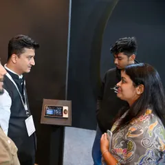 Here I am explaining the features of my central control panel to interested visitors at the Jio World Convention Centre in Mumbai. It's always great to share my passion for smart technology.