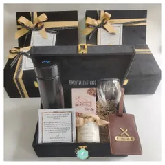 For corporate gifting that feels personal and premium, I curated these elegant black suede boxes. Each hamper includes a mix of practical and luxury items like a temperature-display flask, a personalized leather luggage tag, gourmet almond brittle, and a wine glass, all designed to make your employees and clients feel truly valued.