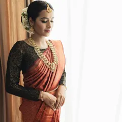 A perfect example of a timeless South Indian bridal look. I guide my students in creating this kind of soft, radiant makeup that enhances the bride's features and complements traditional attire and jewelry.