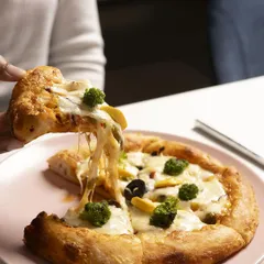 It's all about that perfect cheese pull. Our sourdough pizzas are made with the freshest ingredients for a truly satisfying, cheesy experience you won't forget.