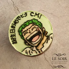 For the love of Zoro. This half-kg Vanilla Caramel cake is made entirely with buttercream, featuring a hand-piped portrait of the One Piece swordsman with Japanese text for "Happy Birthday".