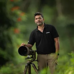 With my camera and tripod, ready for action in the forest. I provide on-field coaching to help you get the most out of your own equipment.