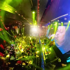 A wide-angle shot showing the scale of the party at Sugar Factory. The combination of lights, a massive LED screen, and a packed floor is what I deliver.