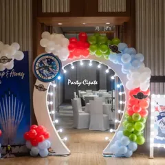 The lighted archway for this fighter jet party created a dramatic and exciting entrance into the hotel ballroom.