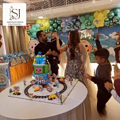 The cake cutting is a highlight of any party. For this Cocomelon-themed first birthday, the family gathered around an elaborate cake table featuring a multi-tiered cake with all the favourite characters, making for a perfect photo opportunity.