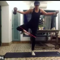 I encourage my runners to step up and lead. Here, one of our runners demonstrates a stability and strength workout for the group. It's about building confidence and sharing knowledge within the community.
