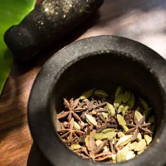 A lot of things at Travancore Tasties are made from scratch, especially my spice mixes. I source whole spices like cardamom and star anise directly from Wayanad and grind them myself to ensure the freshest, most aromatic flavor in my dishes.