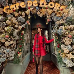 Feeling the Christmas spirit in a festive all-red outfit. I layered a red sweater over a red skirt and paired it with a plaid scarf for a cozy and cheerful holiday look.