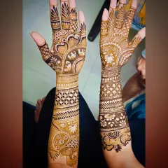 A slightly different edit of the same traditional full-arm design, highlighting the contrast and detail.