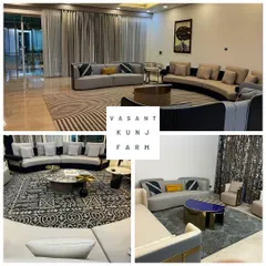 A collage from our Vasant Kunj farmhouse project, showing different seating arrangements within the same large living space. We used curved sofas and Navajo-inspired rugs to define zones, creating intimate conversation areas within the grand room.