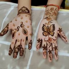 A playful and simple design with a peacock on one hand and a butterfly on the other. This is a great option for someone who wants a unique and less traditional pattern.