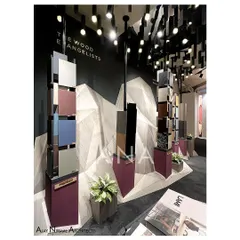 The veneer display totems at the Pllum Legno stall were designed to be viewed up close. Each stand showcases a different collection, allowing visitors to interact with the products within the art-like setting.