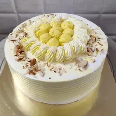My popular Rasmalai cake. This fusion cake combines the flavor of the classic Indian sweet with a soft sponge, topped with rasmalai pieces and nuts.
