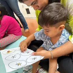 This fine motor activity is all about discovery. A child carefully tears paper to "hatch" the baby animals, practicing pincer grasp and learning about animal life cycles at the same time.