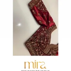 Another angle of a bespoke red velvet bridal blouse, highlighting the intricate patterns and craftsmanship that cover the entire piece. I work closely with brides to create such heirloom-quality designs within their budget.