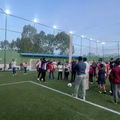 Our community of players and parents gathered on the field for the inauguration ceremony of our new turf.
