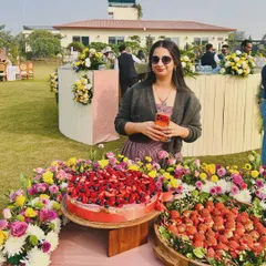 Me with two of my favorite desserts at a family event. Being able to cook for the people I love is what inspired me to start this journey in the first place.