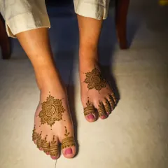 A simple and sweet mandala design for the feet, with detailed work on the toes.